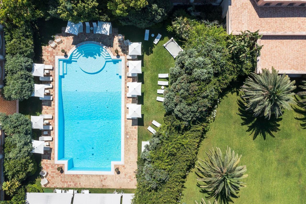 Romano Palace Luxury Hotel Catania Luaran gambar Aerial view of the pool
